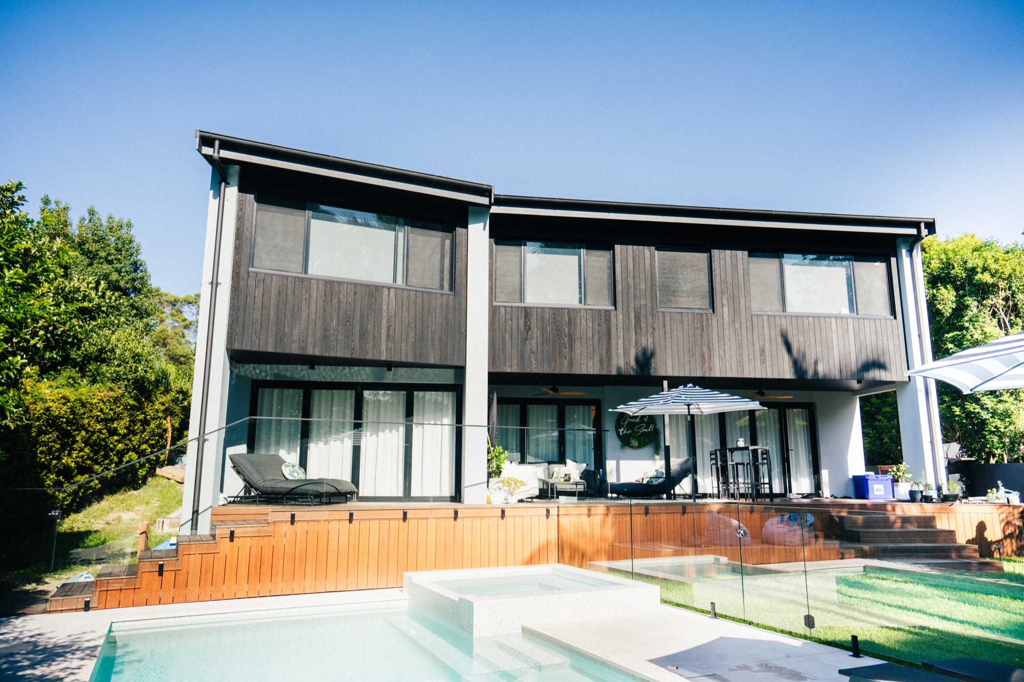 Modern house with new lawn and pool landscaping in the Northern Beaches