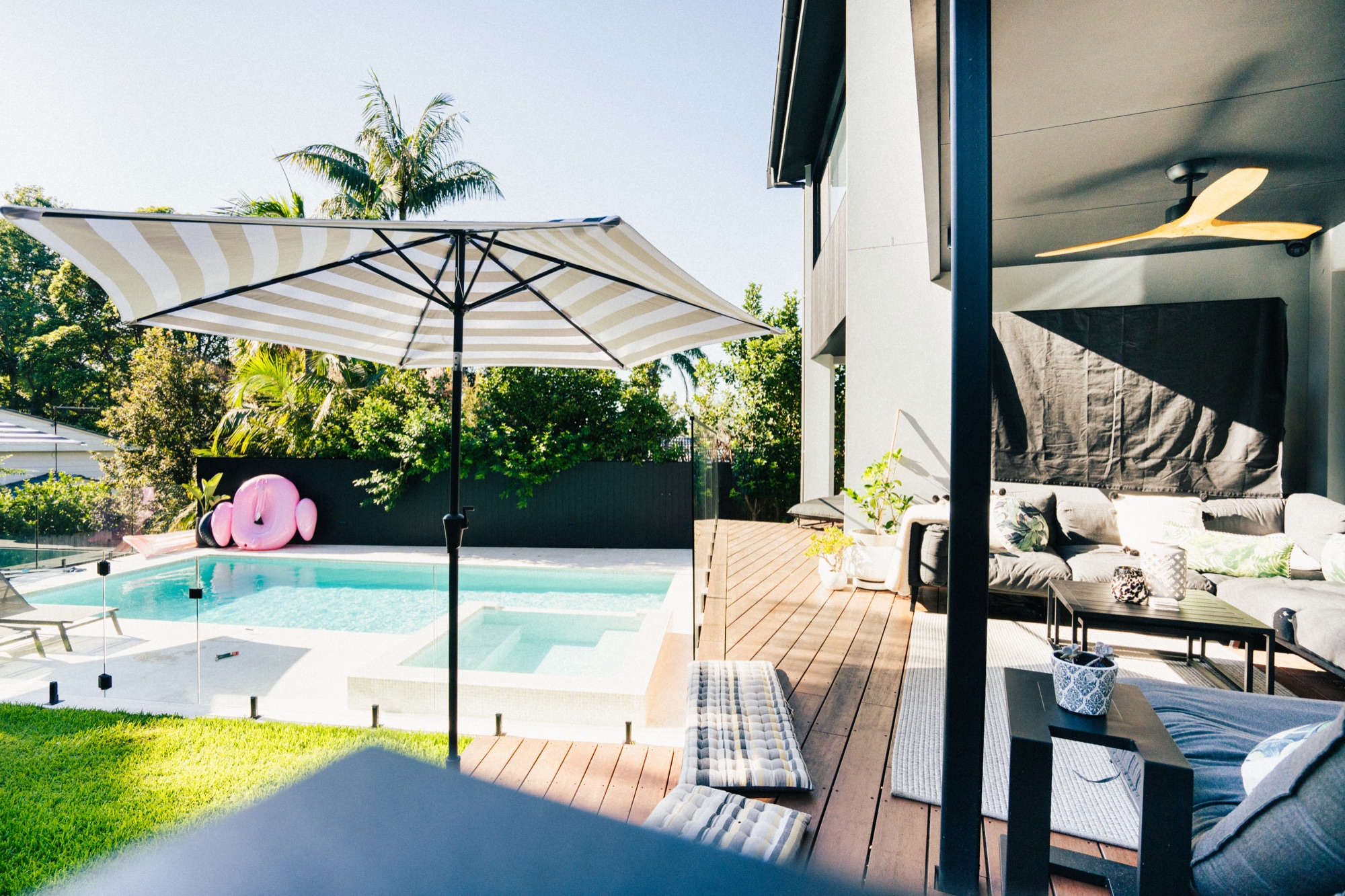 pool-deck-landscaping-northern-beaches Pool and timber deck landscaping with umbrella in the Northern Beaches